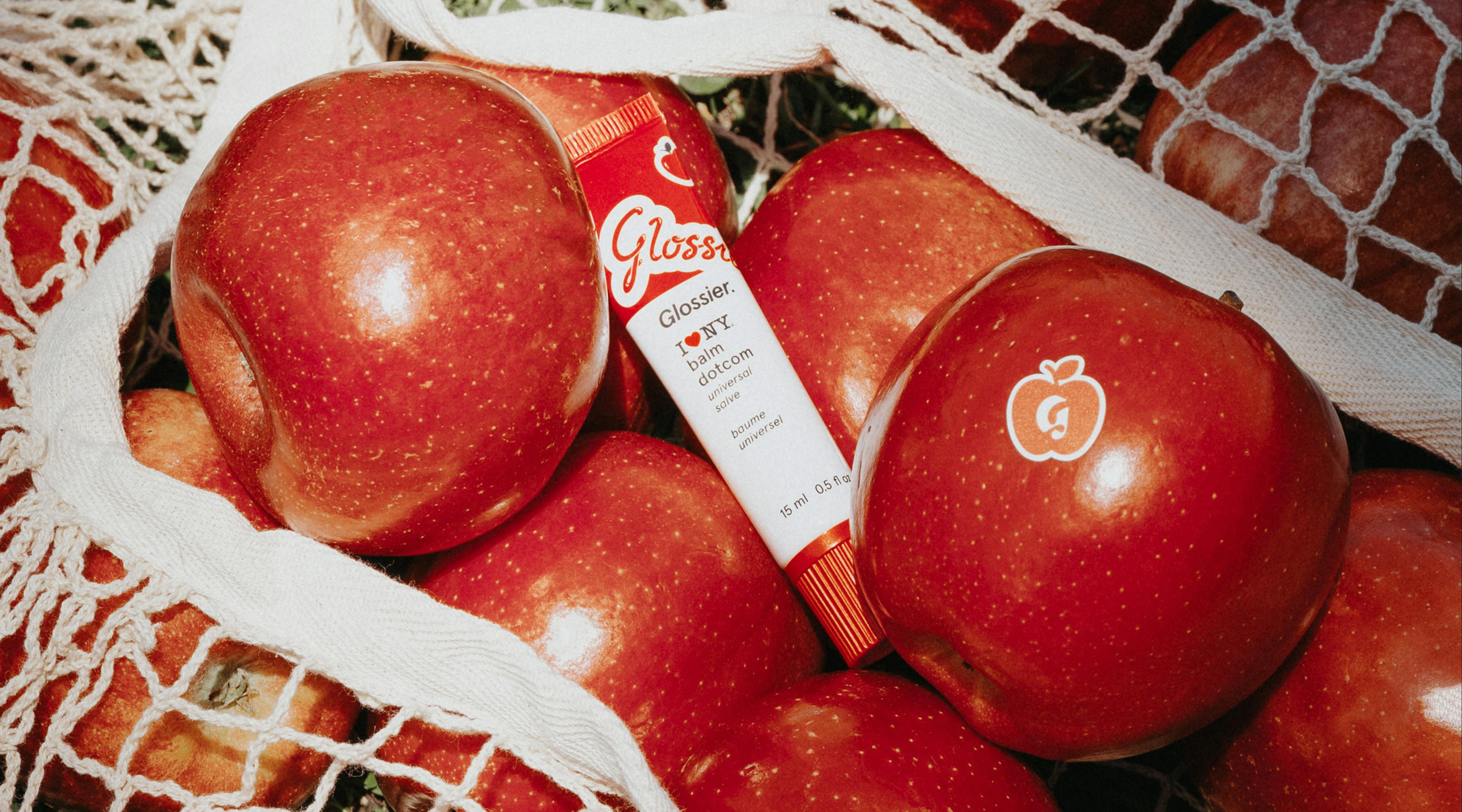 Glossier Balm Dotcom with red apples